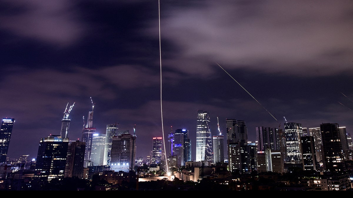Missiles launched from Iran are intercepted as seen from Tel Aviv