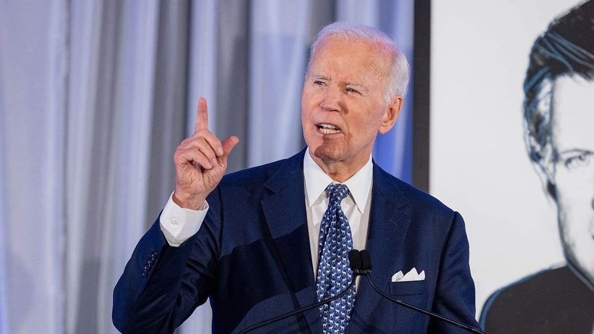 Former President Joe Biden speaking at the Edward Kennedy Institute in Boston