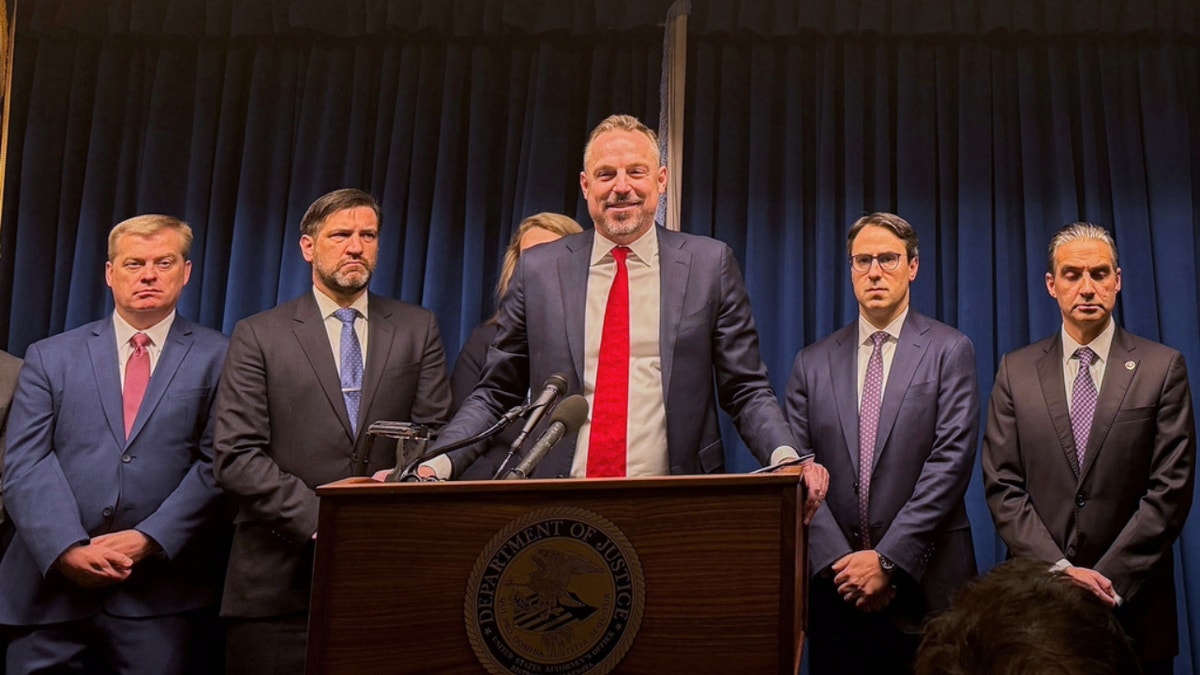 Federal prosecutor Joe Thompson speaking to reporters