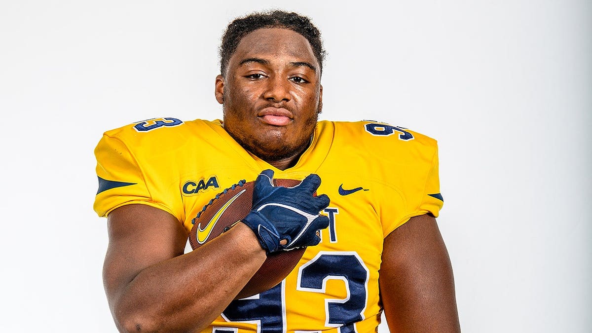 Kelvin Broadhurst Jr. standing in football uniform during 2024 A&T football picture day