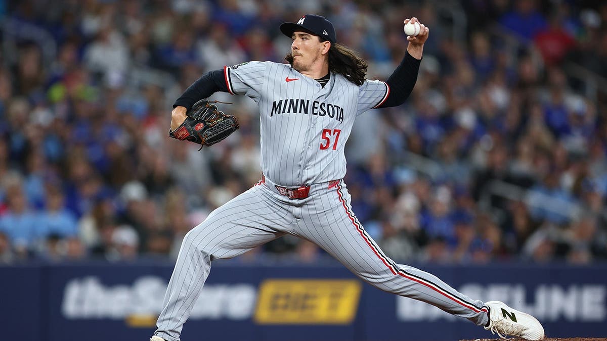 Kody Funderburk pitching for the Minnesota Twins at Rogers Centre in Toronto