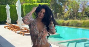 Kylie Jenner Pairs a Belly Chain With Unbuttoned Jeans and a Plunging Top While Celebrating Easter