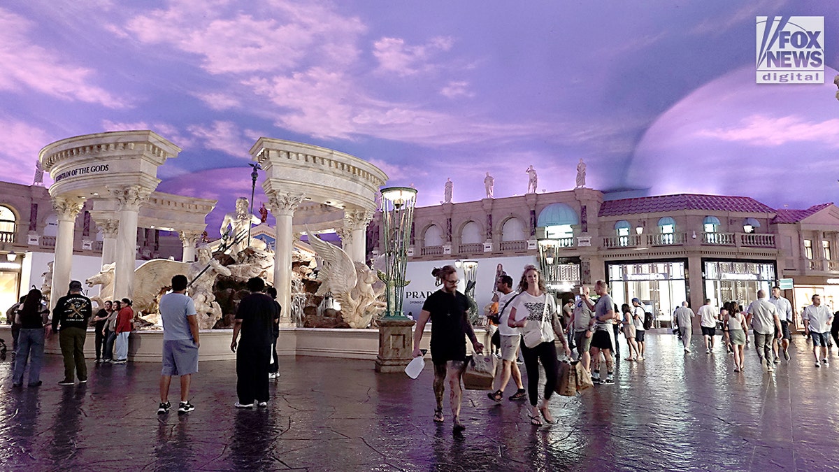 Tourists walking inside Caesars Palace casino hotel in Las Vegas, Nevada.