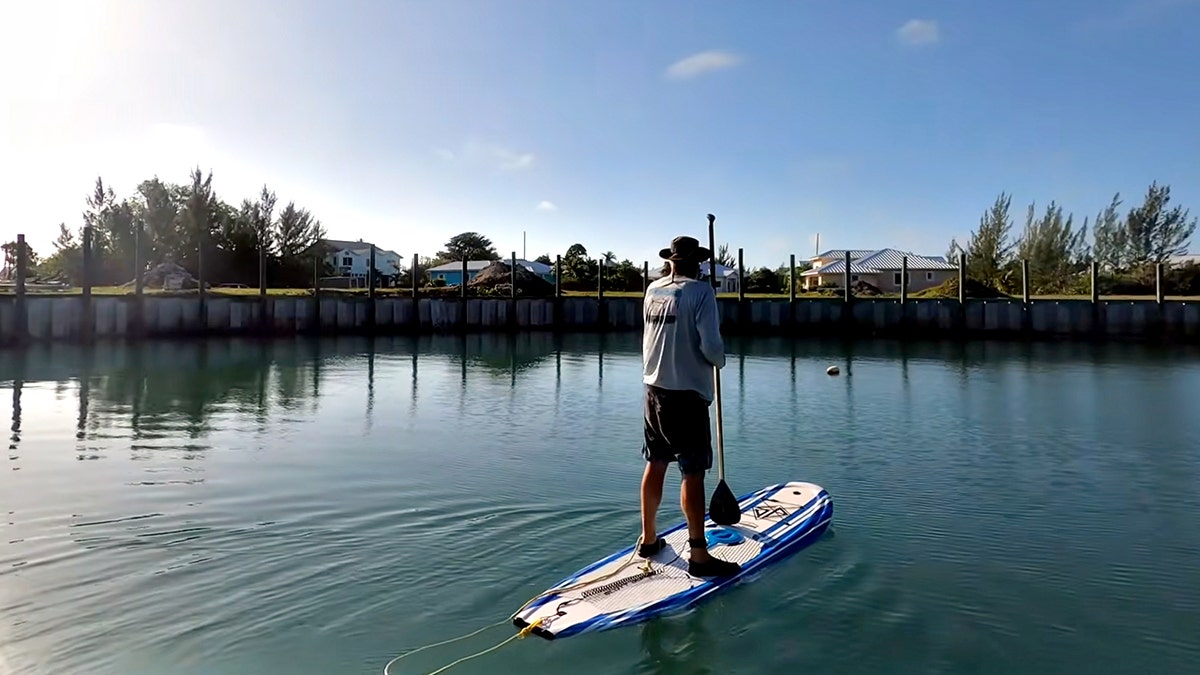 Lynette and Brian Hooker paddleboarding in Bahamas