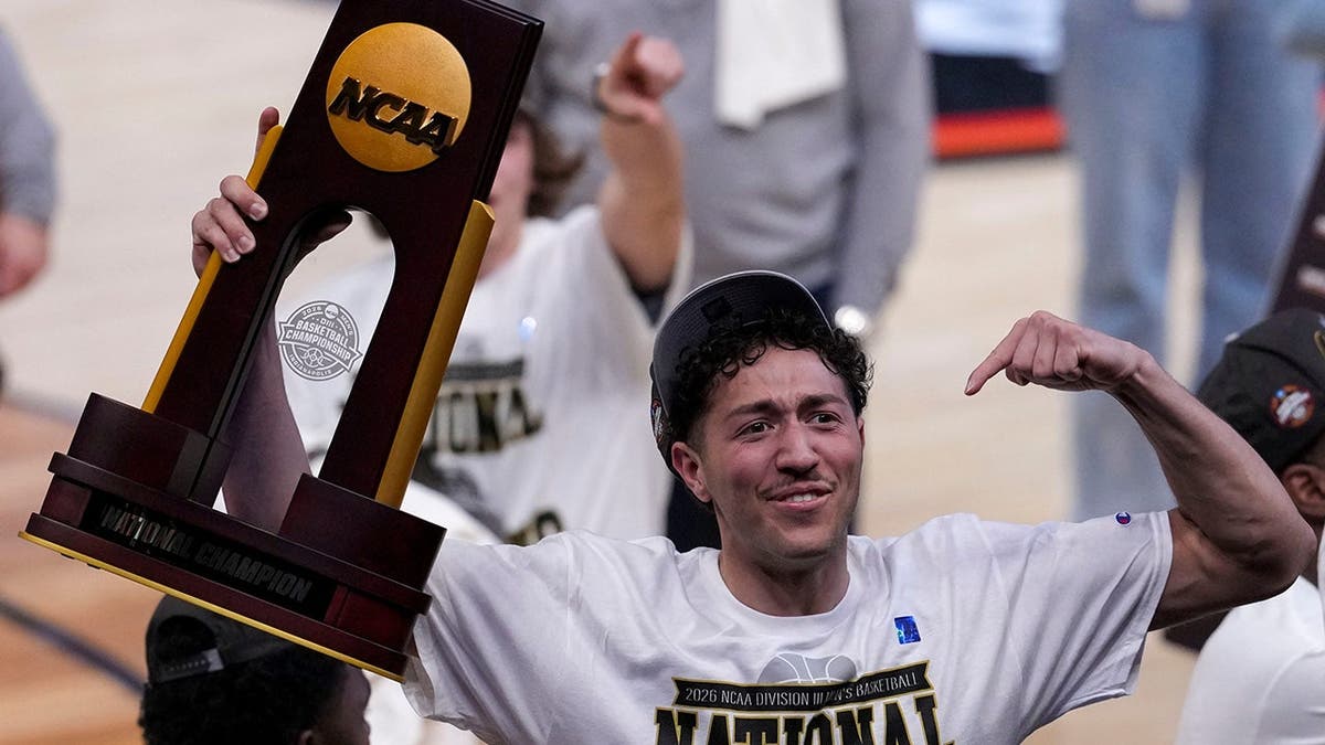 Mary Washington Eagles celebrating on basketball court at Gainbridge Fieldhouse