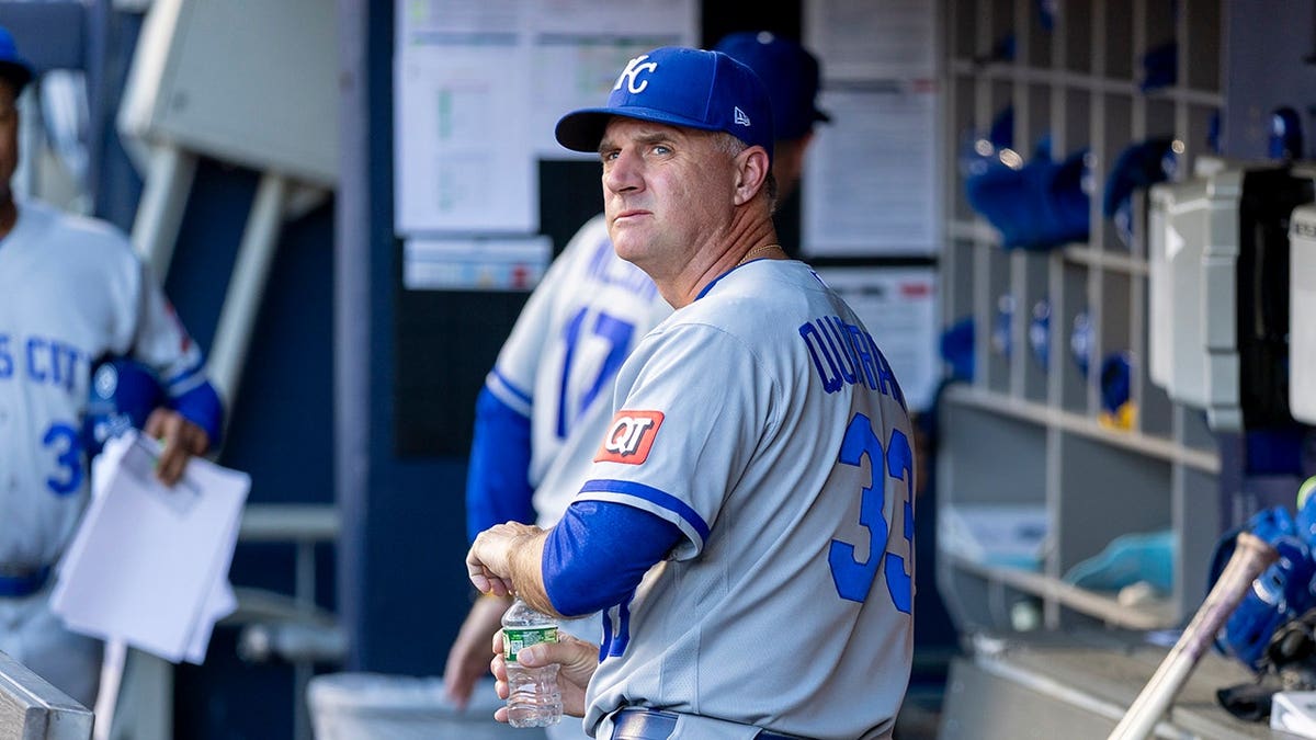 Kansas City Royals manager Matt Quatraro looking at scoreboard at Yankee Stadium