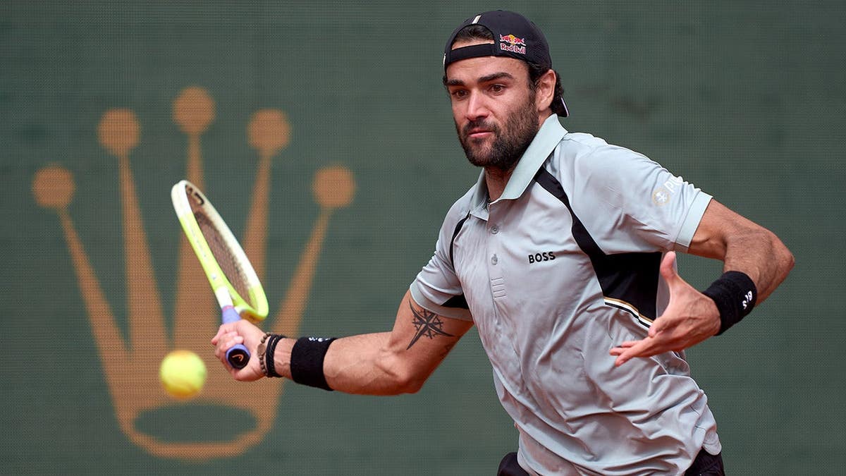 Matteo Berrettini hitting a forehand during a tennis match at Monte-Carlo Country Club