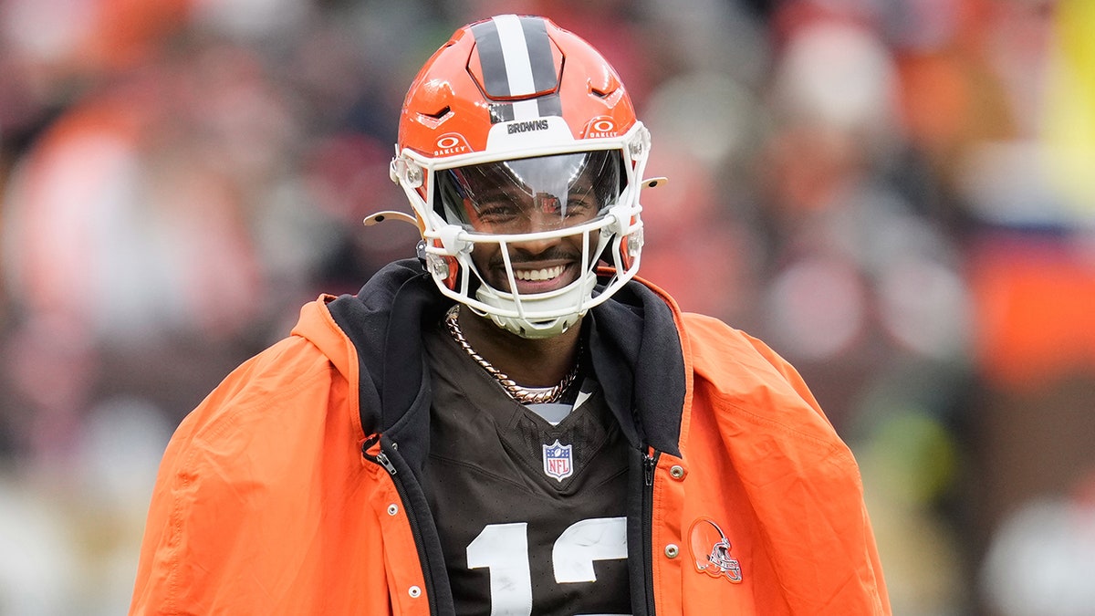 Cleveland Browns quarterback Shedeur Sanders reacting on the sideline during an NFL game