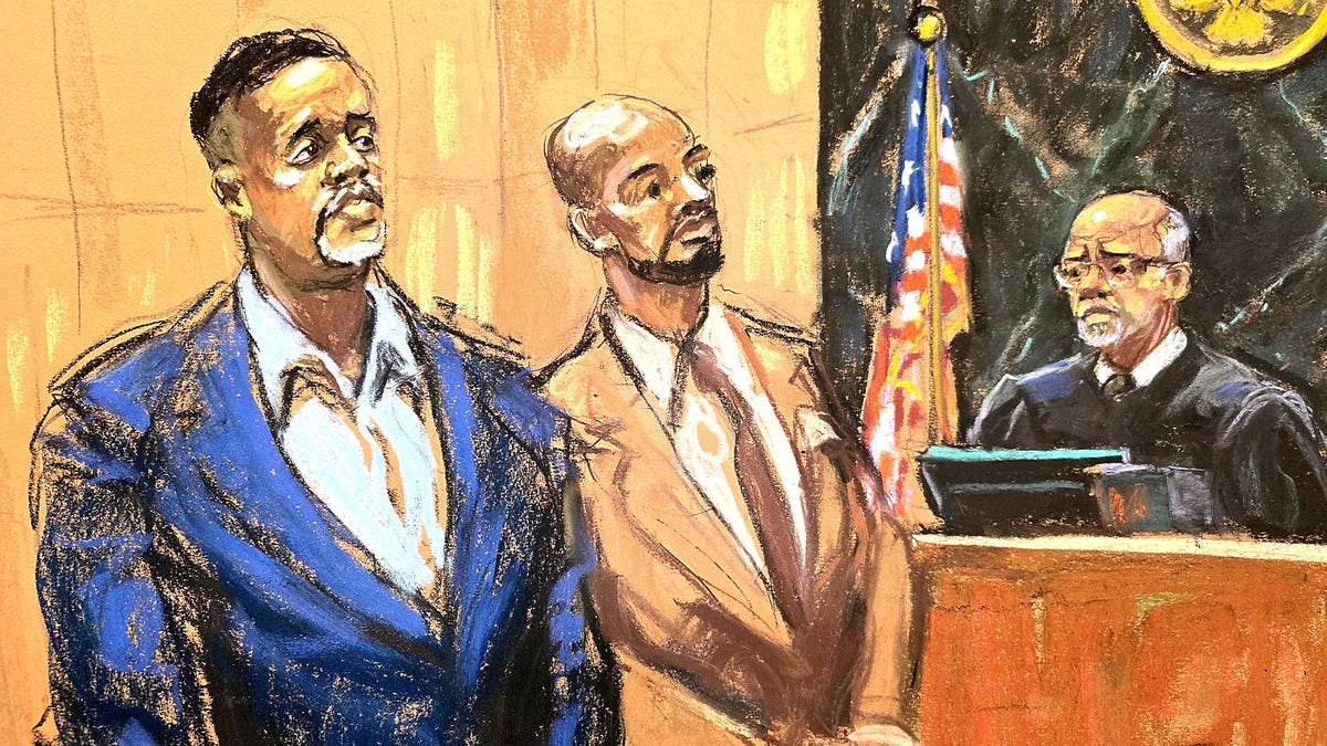 Former NBA player Damon Jones standing with attorney Kenneth Montgomery before Judge Ramon Reyes in federal court