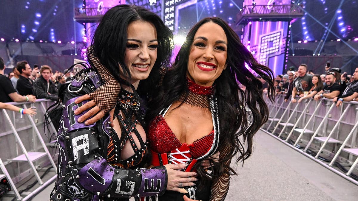 Paige and Brie Bella entering Allegiant Stadium during WrestleMania 42 Night 1