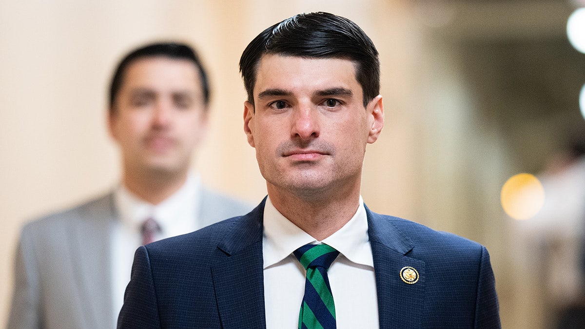 Rep. Rob Bresnahan walking through a hallway at the U.S. Capitol