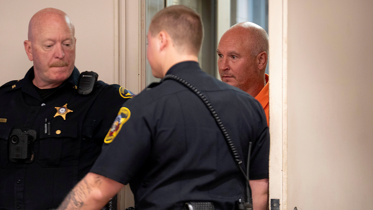 Robert McCaffrey escorted by officers into New Jersey courtroom