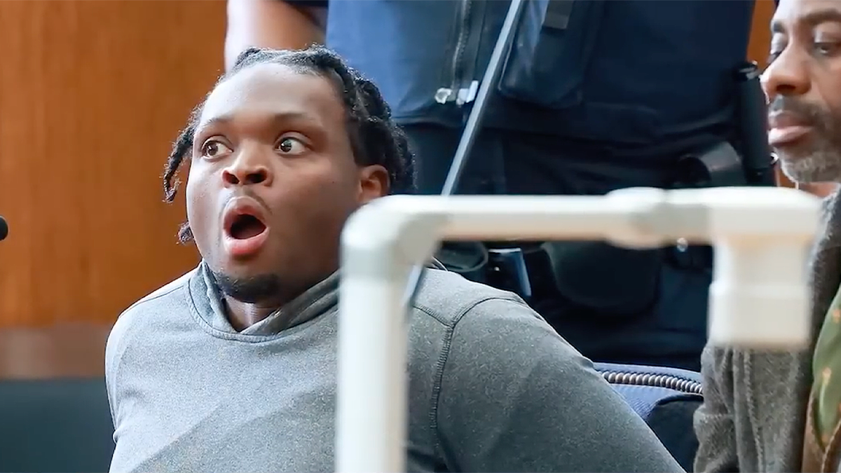 Shaquille Coke reacts in court during NYC acid attack arraignment