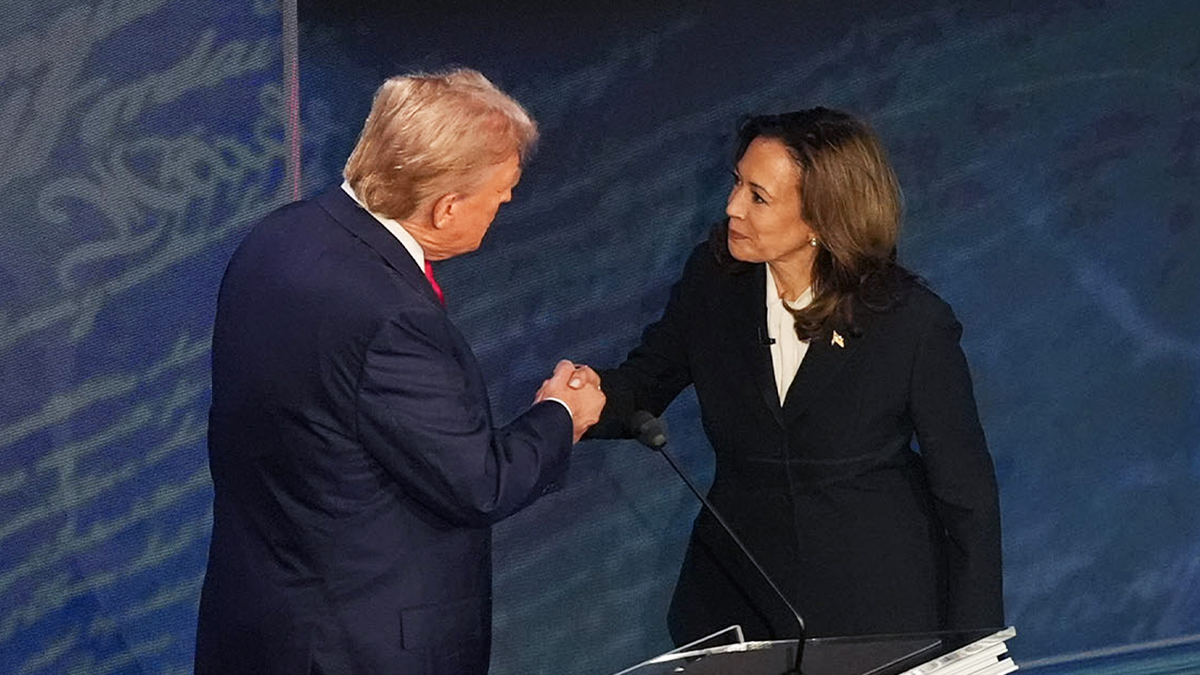 Then-Vice President Kamala Harris and Republican presidential candidate Donald Trump shaking hands before debate in Philadelphia