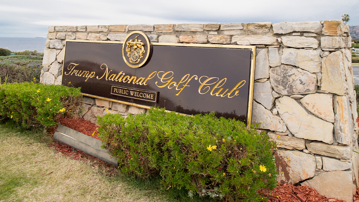 A closeup of the Trump National Golf Club sign in Los Angeles