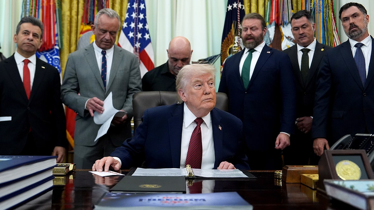 President Donald Trump signing an executive order