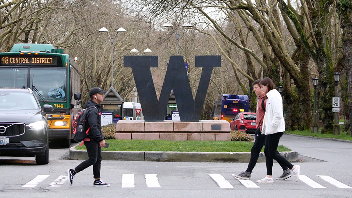 University of Washington campus logo on building exterior
