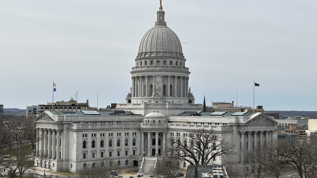 Wisconsin state capitol building in Madison with blue sky background