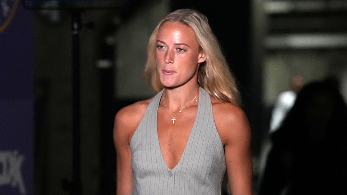 Sophie Cunningham walking into Crypto.com Arena before a basketball game.