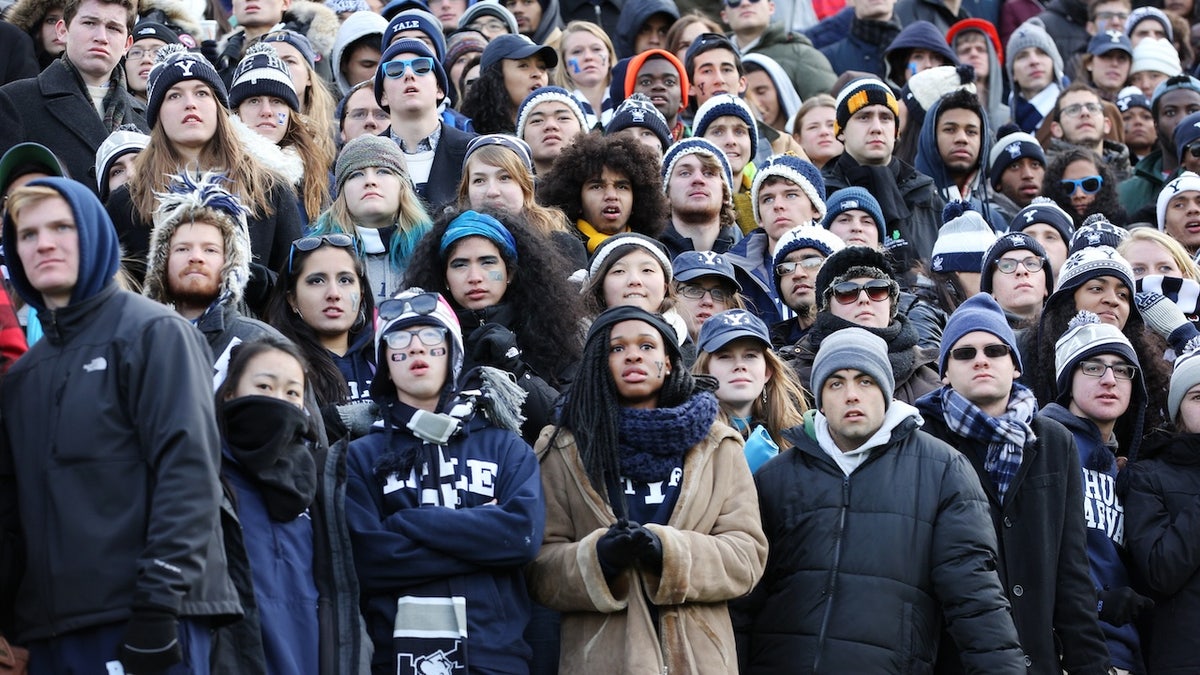 Yale fans watching their team's loss at Harvard Stadium in Boston