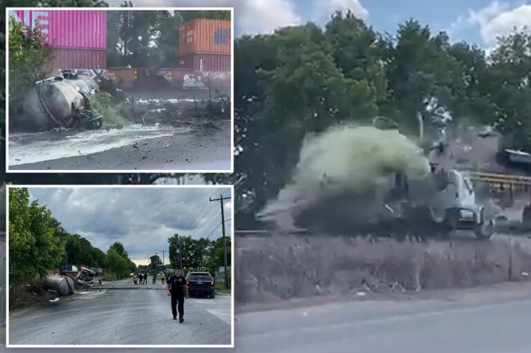 Horror as train collides with truck carrying septic tank, seriously injuring driver: video