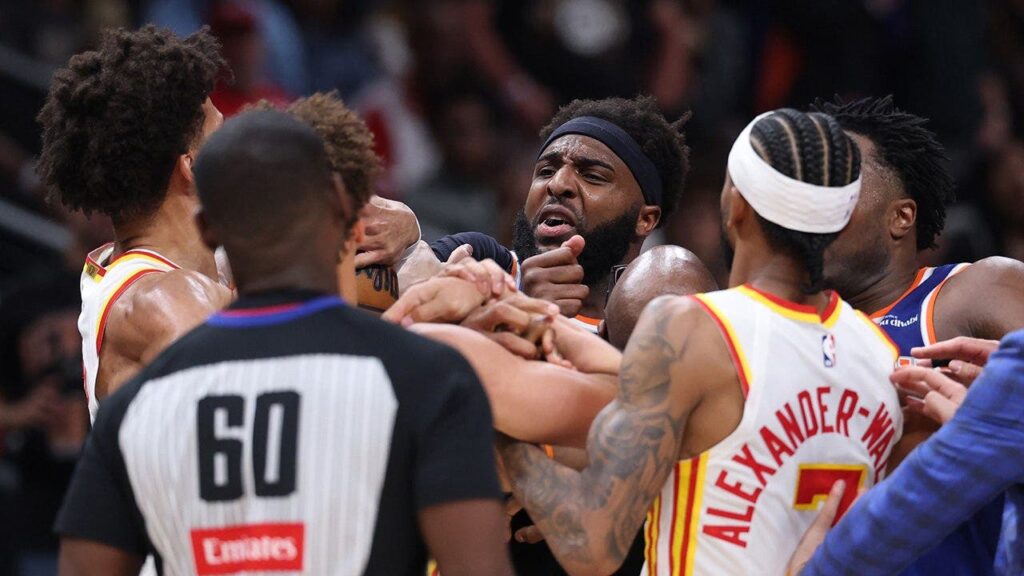 Two players ejected after scrum amid Knicks’ 50-point lead against Hawks sends referee crashing to the court