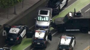 Rideshare passenger held hostage for eight hours during armed standoff with police in swanky neighborhood