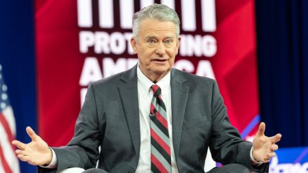 Trump-backed governor wins GOP primary for third term after running on deregulation and tax cuts