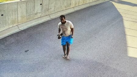 Minnesota fraud suspect who jumped from building is arrested, FBI says