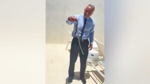 RFK Jr barehands a pair of snakes on Dr. Oz’s patio in wild video RFK Jr barehands a pair of snakes on Dr. Oz’s patio in wild video