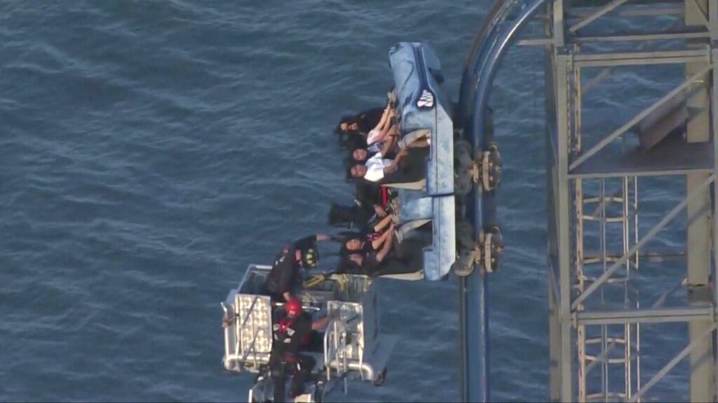 Eight riders left dangling atop 100-foot roller coaster for over three hours at Texas amusement park Eight riders left dangling atop 100-foot roller coaster for over three hours at Texas amusement park