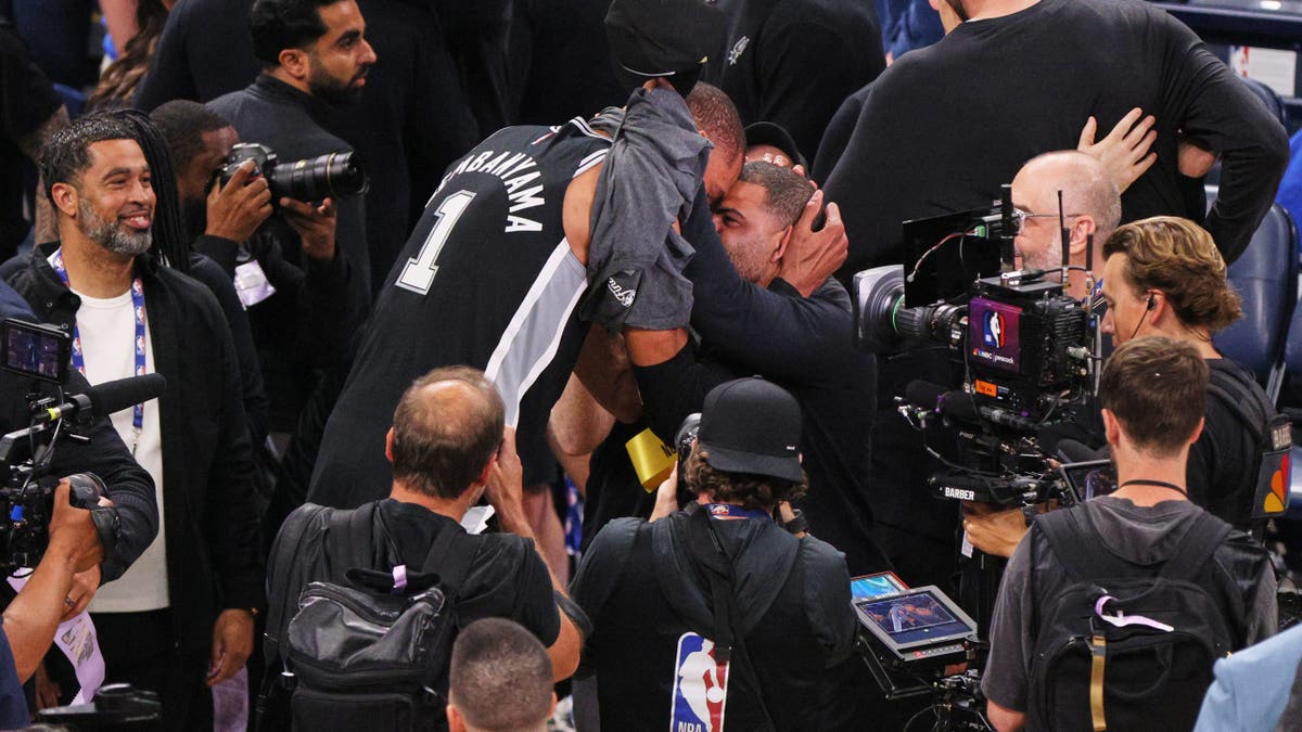 Victor Wembanyama celebrating on basketball court after Spurs win