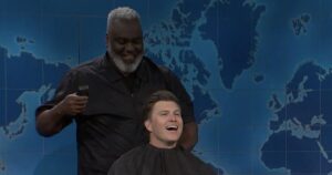 Colin Jost Is Nearly Forced to Shave His ‘Award-Winning Hair’ During ‘Saturday Night Live’ Joke Swap