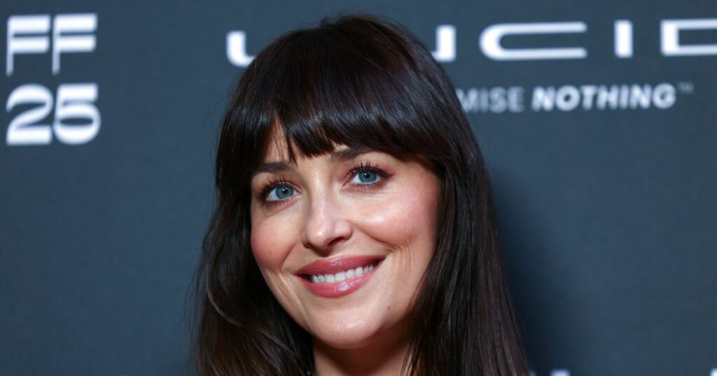 Dakota Johnson Is Rocking This Bold Bag Color — And It Makes Any Outfit Look Designer