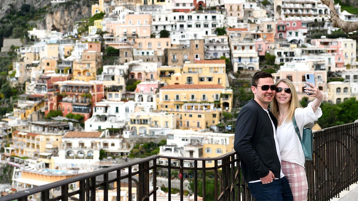 Couple taking selfie in Positano