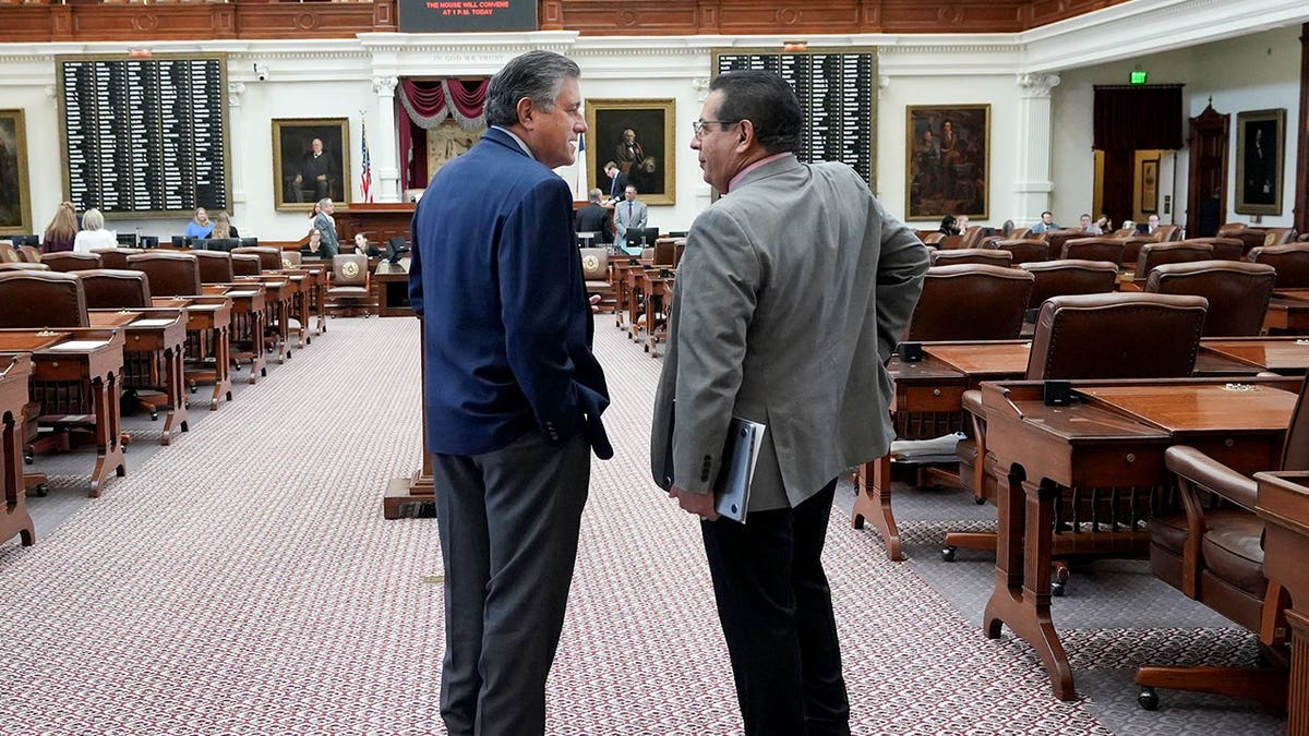 John Lujan, on the right, is running for Congress