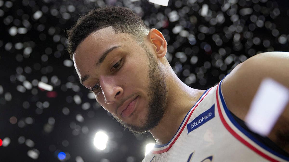 Ben Simmons standing on basketball court after an NBA playoff game