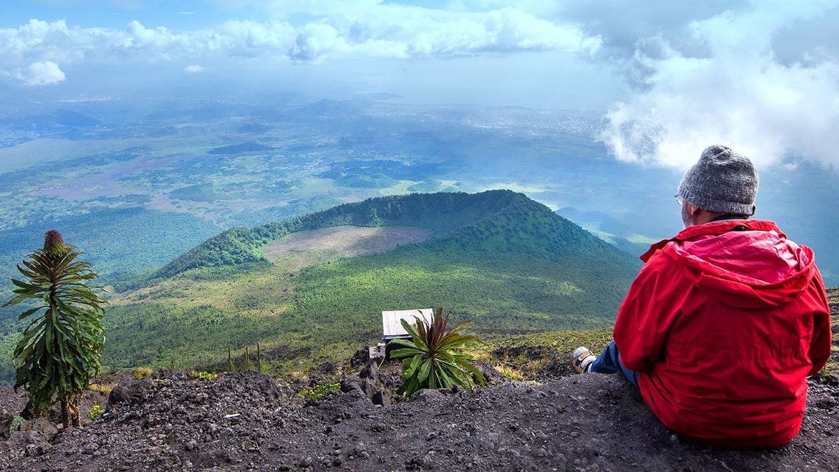 Tourist viewing mountains in Congo