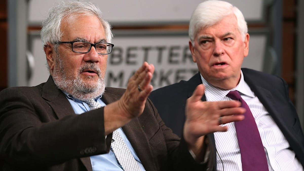 Barney Frank and Chris Dodd standing together in Washington, D.C.