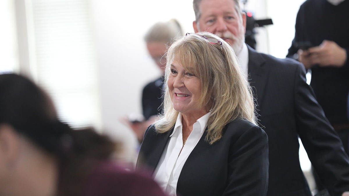 Former Colleton County Clerk of Court Becky Hill smiling in a courtroom