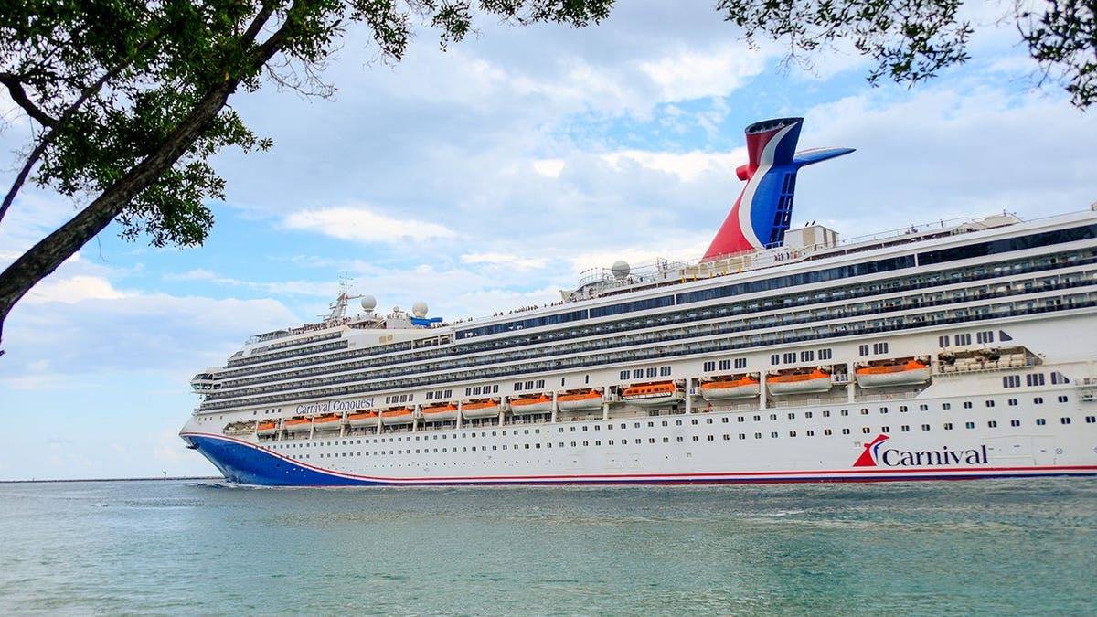 Carnival Conquest cruise ship sailing out of the port of Miami, Florida