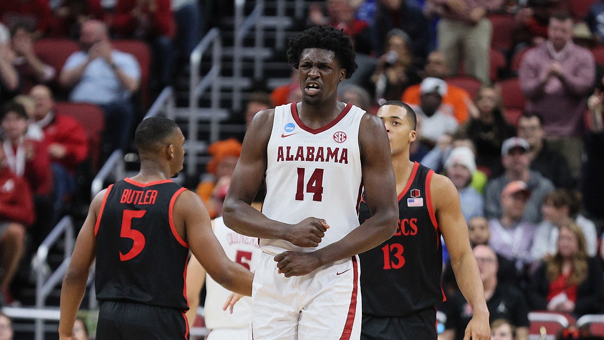 Charles Bediako reacting on court during NCAA tournament game