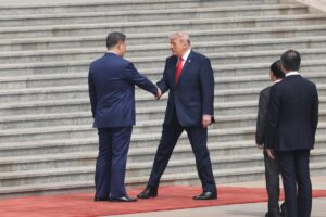 Trump greets Xi in Beijing to kick off historic China summit