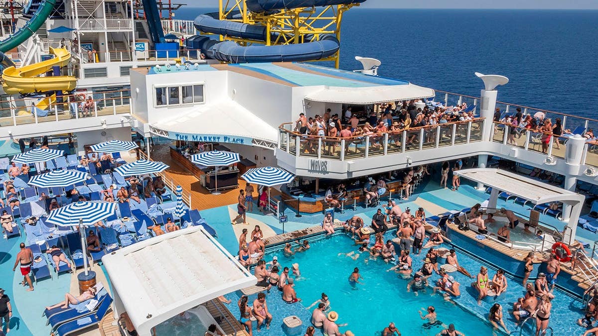 Norwegian Cruise Line cruise ship pool deck with Aqua Park waterslides in Valletta Malta