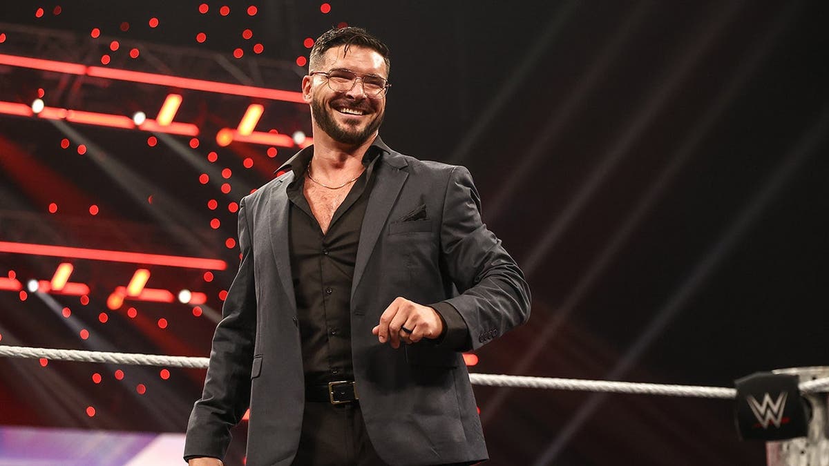 Ethan Page entering the wrestling ring at Thompson-Boling Arena in Knoxville, Tennessee