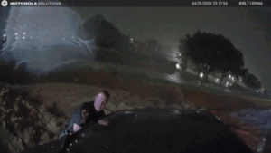 Heart-stopping video shows officers use unlikely tool to save family trapped in floodwaters