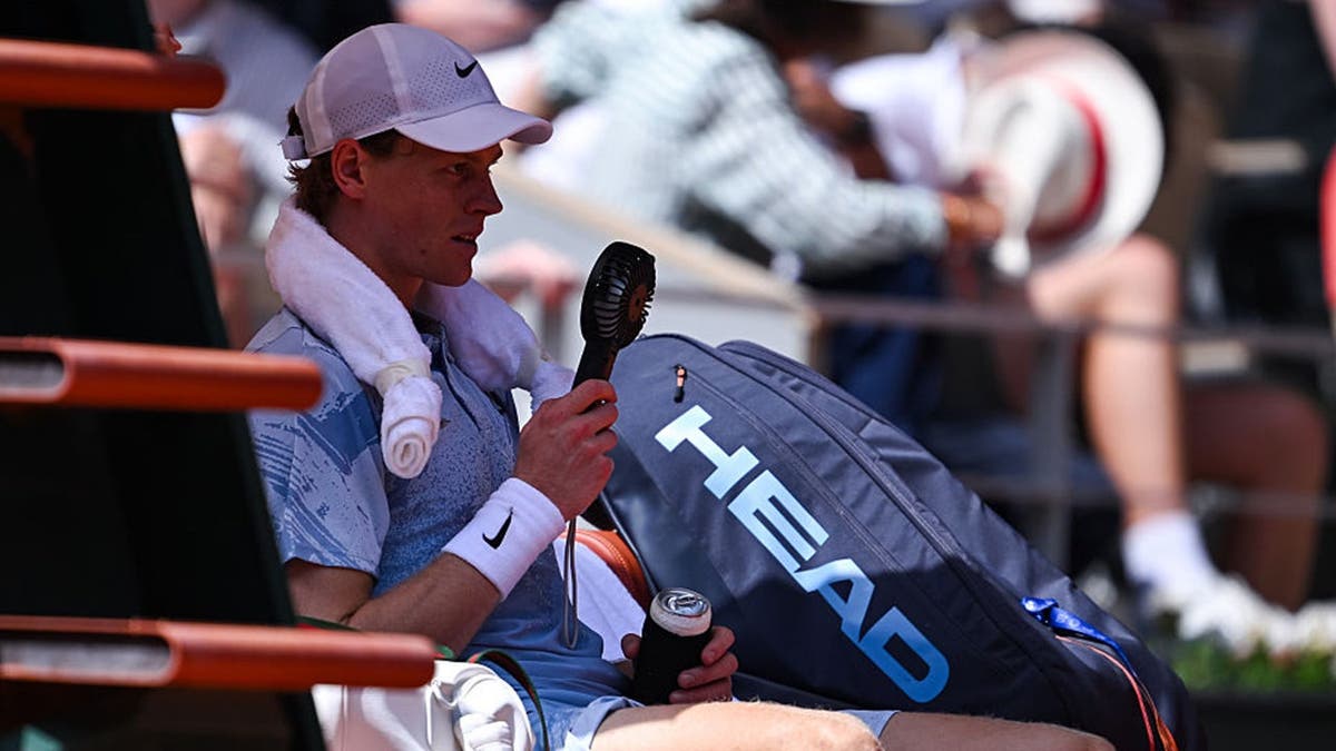 jannik sinner with fan at french open