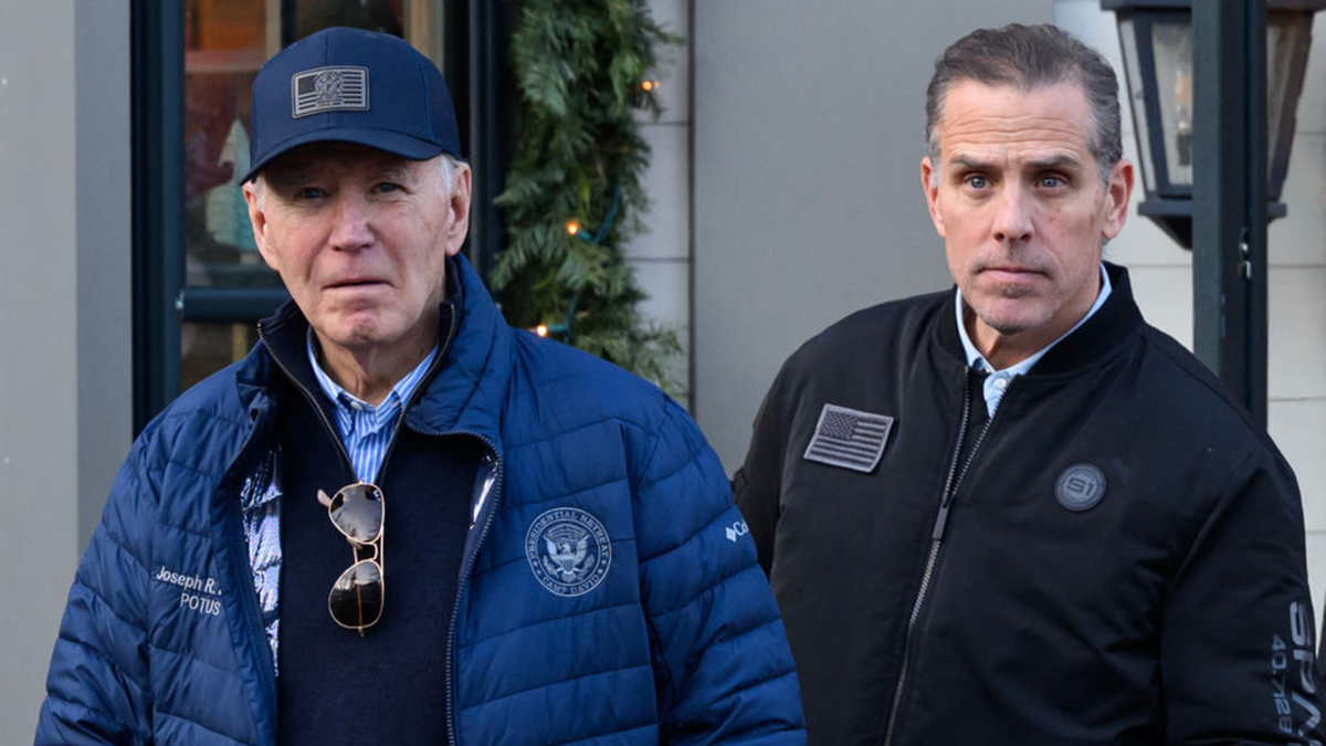 Former President Joe Biden and his son Hunter Biden standing side by side