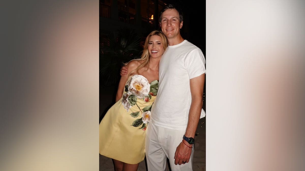 Ivanka Trump wearing a floral yellow dress and Jared Kushner smiling together in the Bahamas.