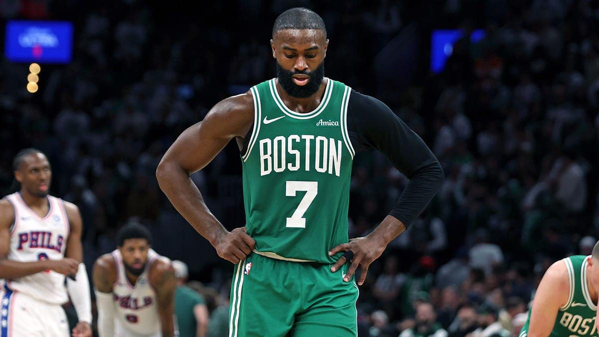 Boston Celtics' Jaylen Brown dribbling basketball during final minutes of Game 7 in Boston